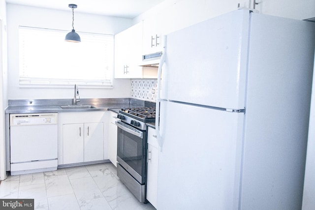 kitchen with marble finish floor, a sink, stainless steel counters, white appliances, and white cabinets