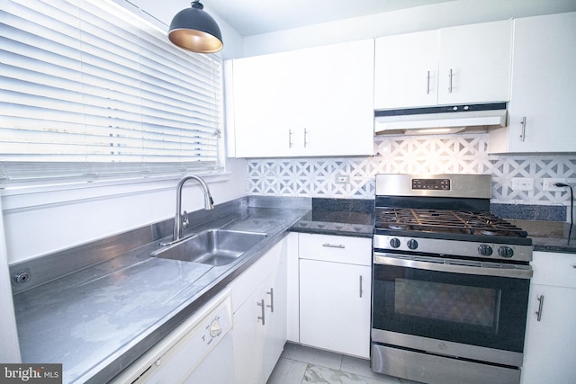 kitchen featuring under cabinet range hood, white dishwasher, marble finish floor, stainless steel gas range, and a sink