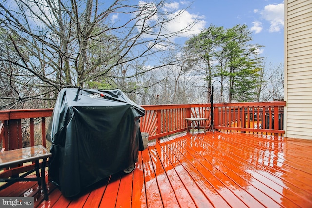 deck featuring a grill