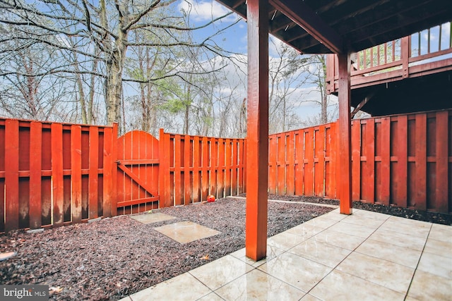 view of patio / terrace featuring a fenced backyard and a gate