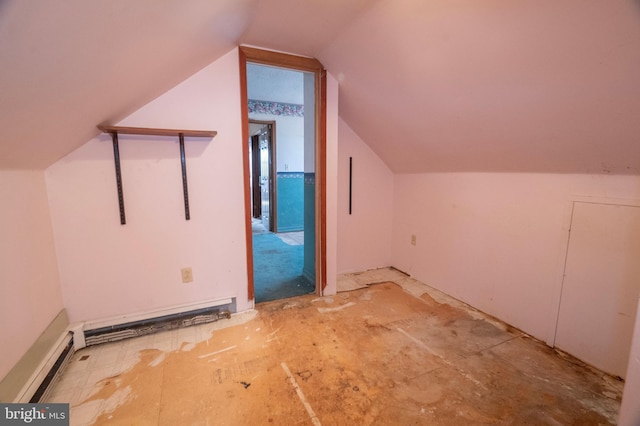 additional living space with lofted ceiling and a baseboard radiator