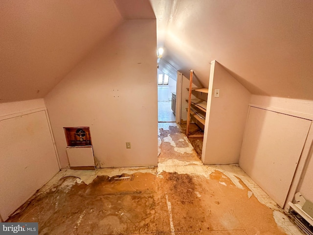 bonus room featuring lofted ceiling