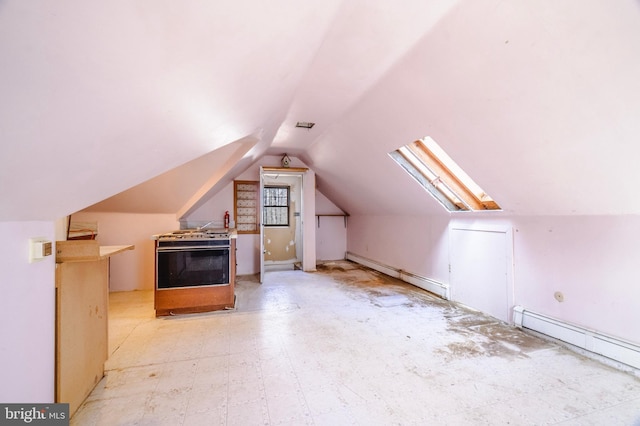 bonus room featuring vaulted ceiling, a baseboard radiator, and tile patterned floors