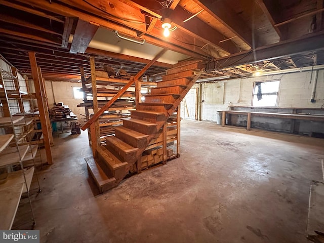 basement featuring stairway