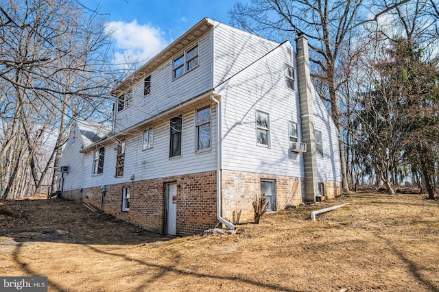 view of side of property with a chimney