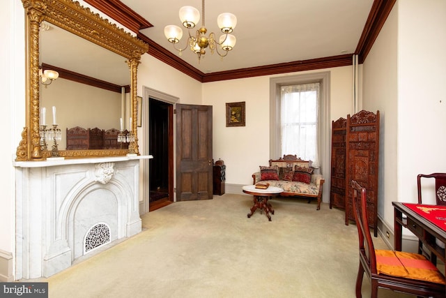 sitting room featuring carpet floors, ornamental molding, baseboards, and an inviting chandelier