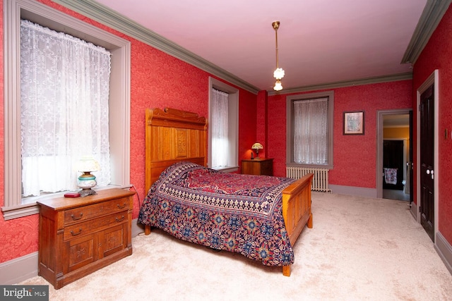 bedroom with baseboards, carpet, and crown molding