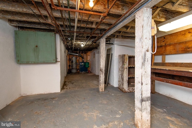 unfinished basement with a heating unit