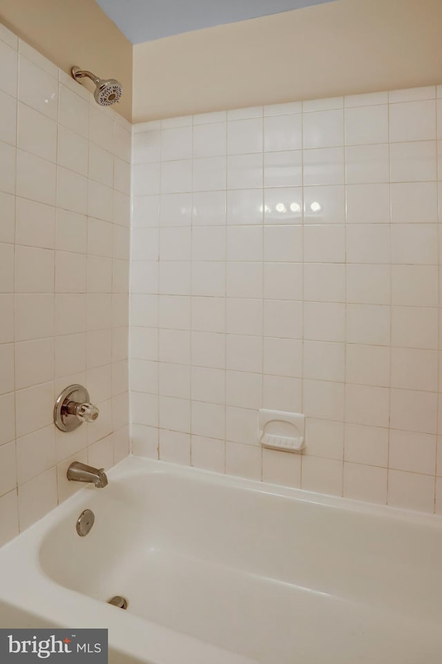 full bath featuring shower / bathing tub combination