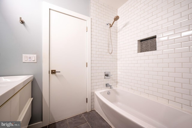 full bath featuring tub / shower combination, vanity, and tile patterned floors