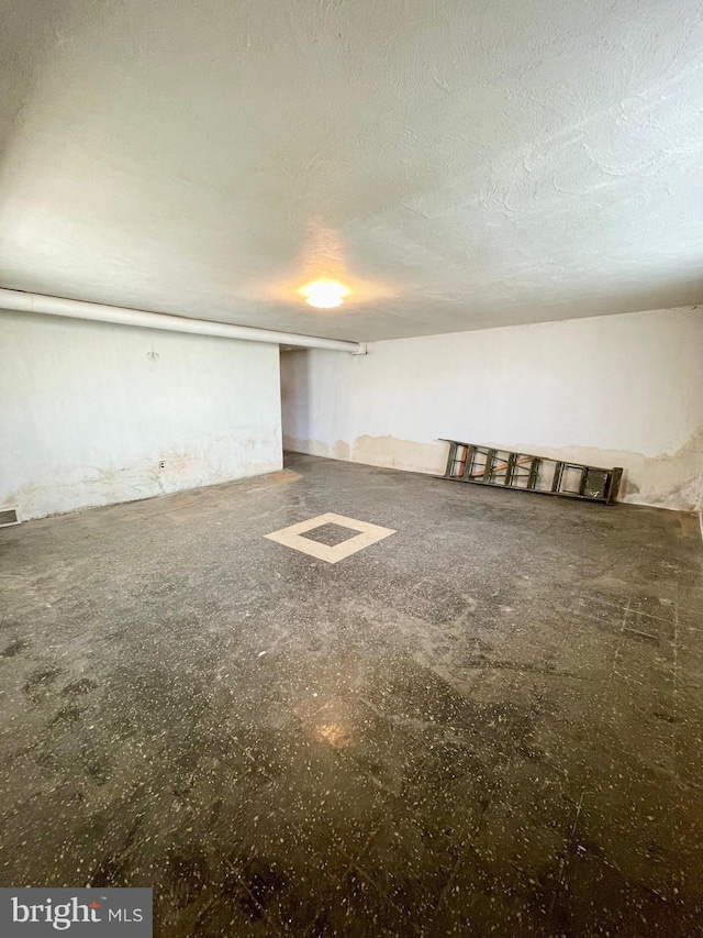 interior space featuring a textured ceiling