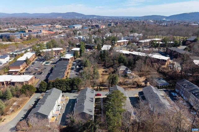 birds eye view of property with a mountain view