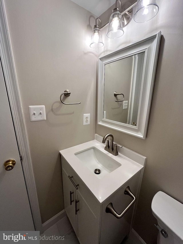 half bath with toilet and vanity