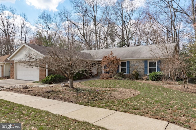 single story home with an attached garage, driveway, a front lawn, and brick siding