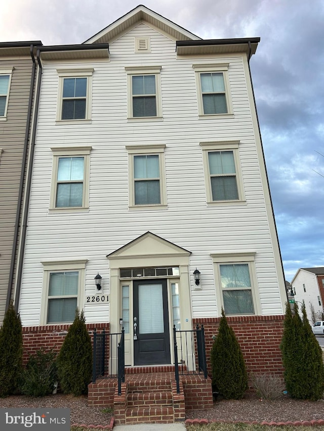 multi unit property with brick siding