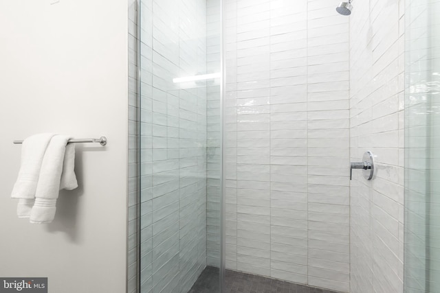 full bathroom featuring a shower stall