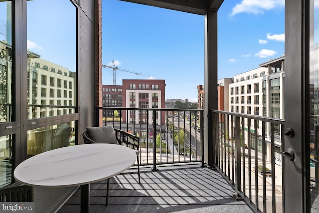 balcony featuring a view of city