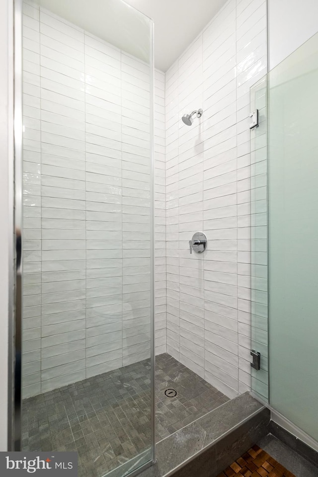 full bathroom with a shower stall