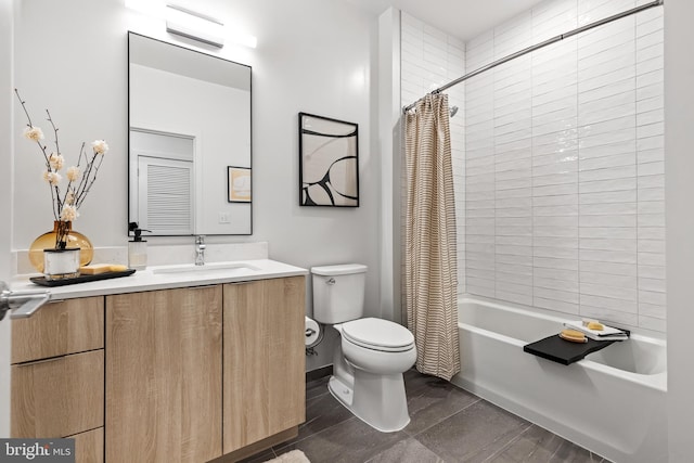 bathroom featuring shower / bath combo, vanity, toilet, and baseboards