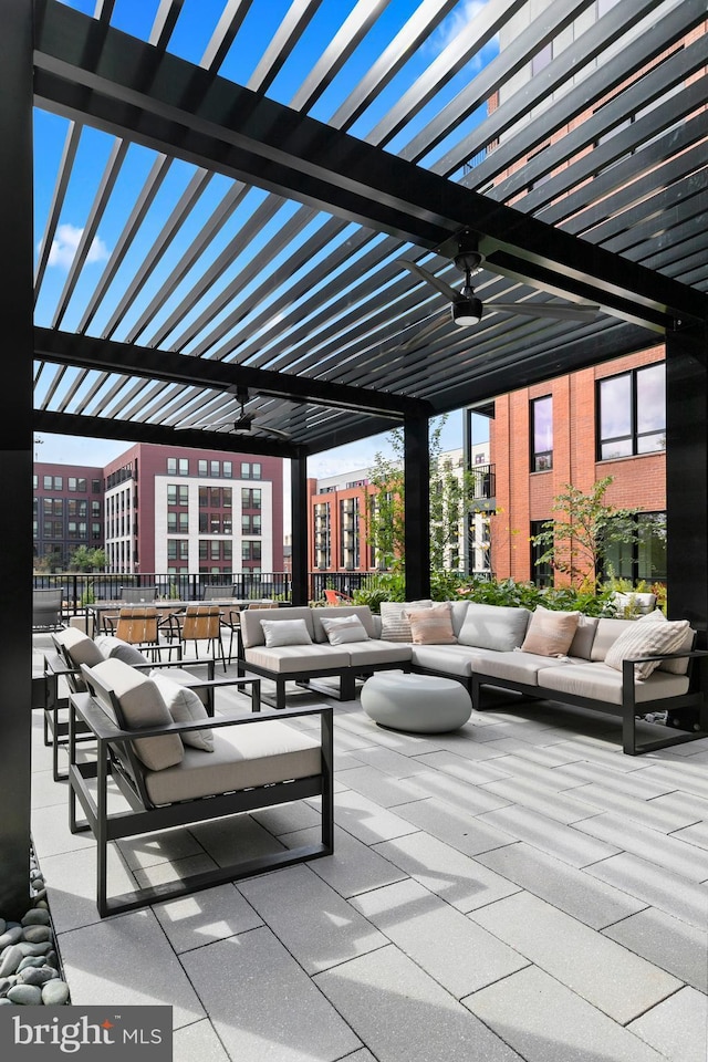 view of patio featuring a ceiling fan, outdoor lounge area, and a pergola