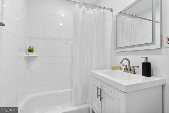 full bathroom with shower / bathtub combination with curtain and vanity