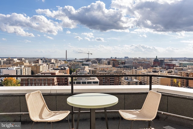 balcony featuring a city view