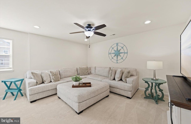 living room featuring recessed lighting, visible vents, light carpet, ceiling fan, and baseboards