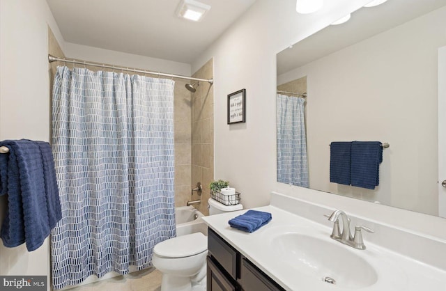 bathroom featuring vanity, toilet, and shower / bathtub combination with curtain