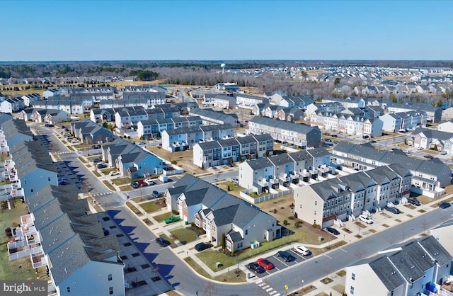 birds eye view of property with a residential view