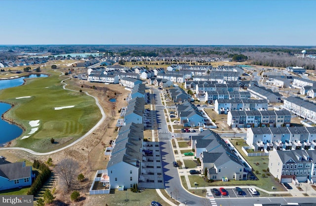 bird's eye view featuring a water view and a residential view