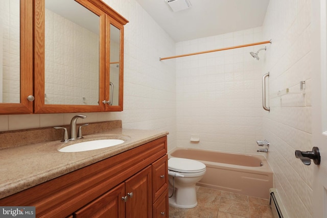 bathroom featuring visible vents, toilet, tub / shower combination, baseboard heating, and vanity