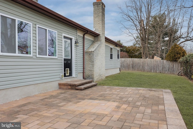 view of patio featuring fence