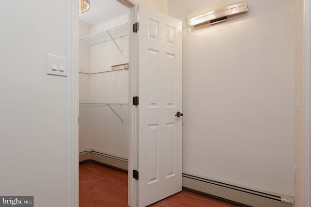 closet with a baseboard radiator