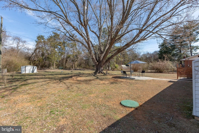 view of yard with a patio area