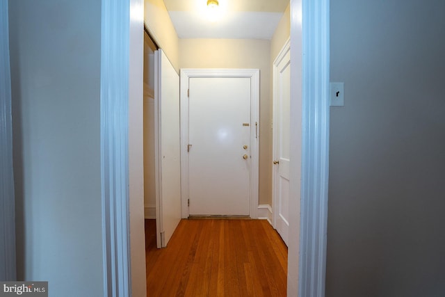 hall featuring wood finished floors