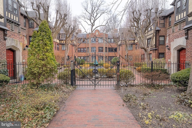 view of gate featuring fence