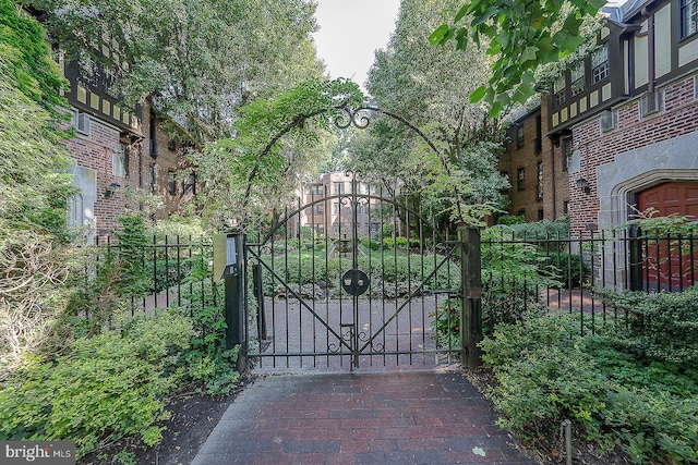 view of gate featuring fence