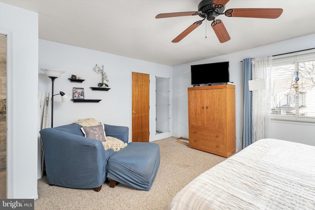 carpeted bedroom with lofted ceiling and ceiling fan