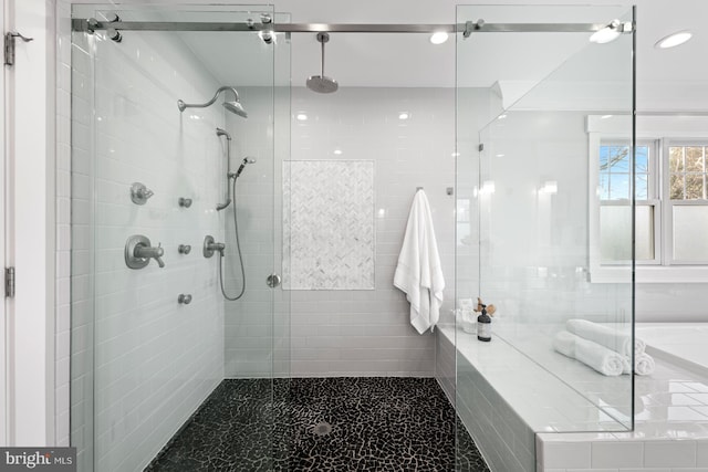 bathroom with a shower stall