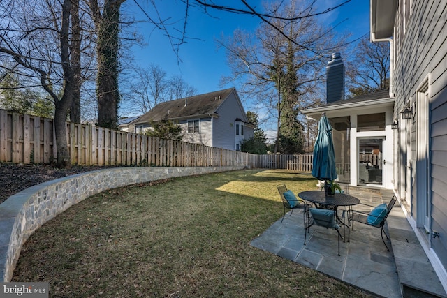 view of yard featuring a fenced backyard and a patio