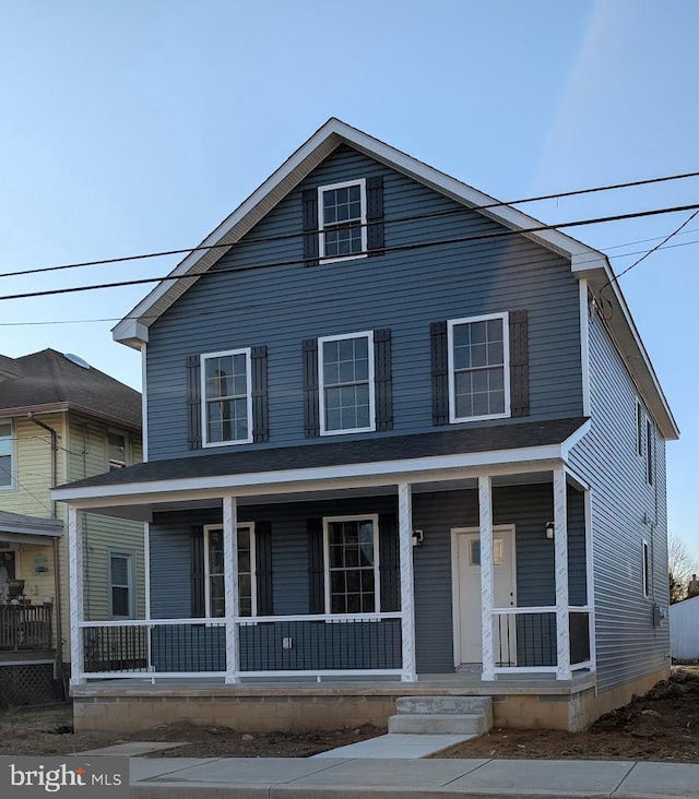 view of front of home featuring covered porch