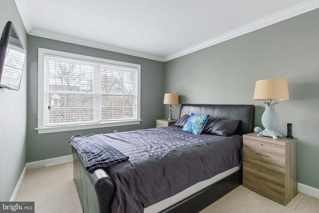 bedroom with light carpet, baseboards, and crown molding