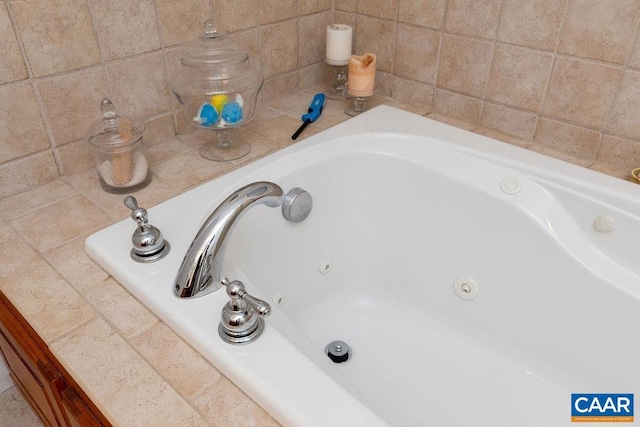 room details with a sink and a whirlpool tub