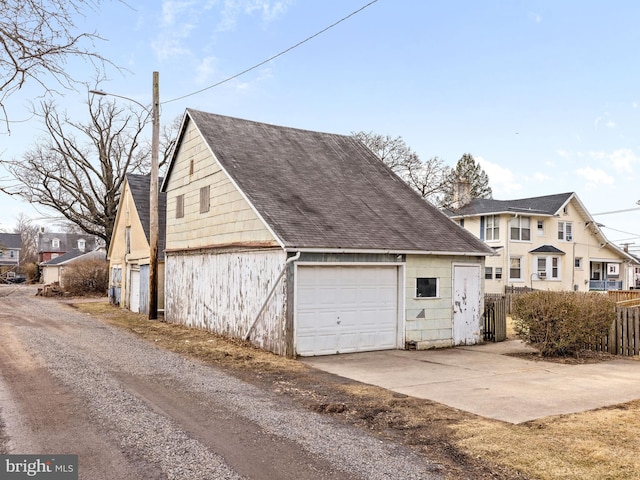 detached garage with fence