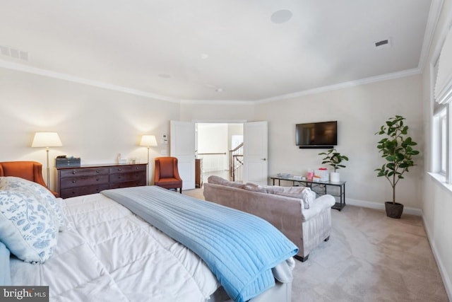 bedroom featuring visible vents, crown molding, light carpet, and baseboards