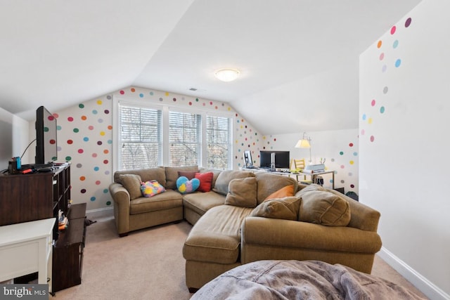 living room with lofted ceiling, baseboards, visible vents, and light colored carpet