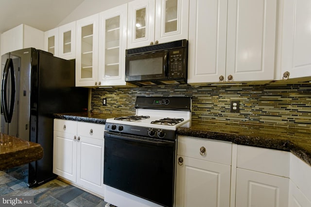 kitchen featuring glass insert cabinets, black appliances, white cabinetry, and decorative backsplash