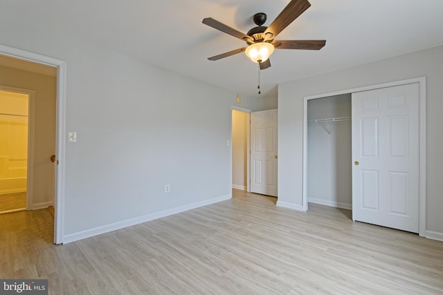 unfurnished bedroom featuring a ceiling fan, a closet, baseboards, and light wood finished floors