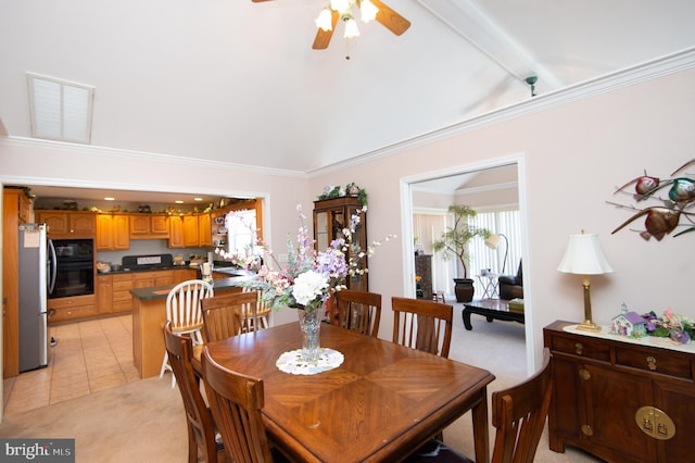 9 Holly Ter, Cambridge, MD 21613 - dining space with visible vents, lofted ceiling with beams, ceiling fan, ornamental molding, and light colored carpet