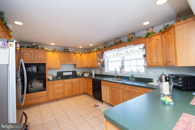 9 Holly Ter, Cambridge, MD 21613 - kitchen featuring black appliances, light tile patterned floors, recessed lighting, and a sink